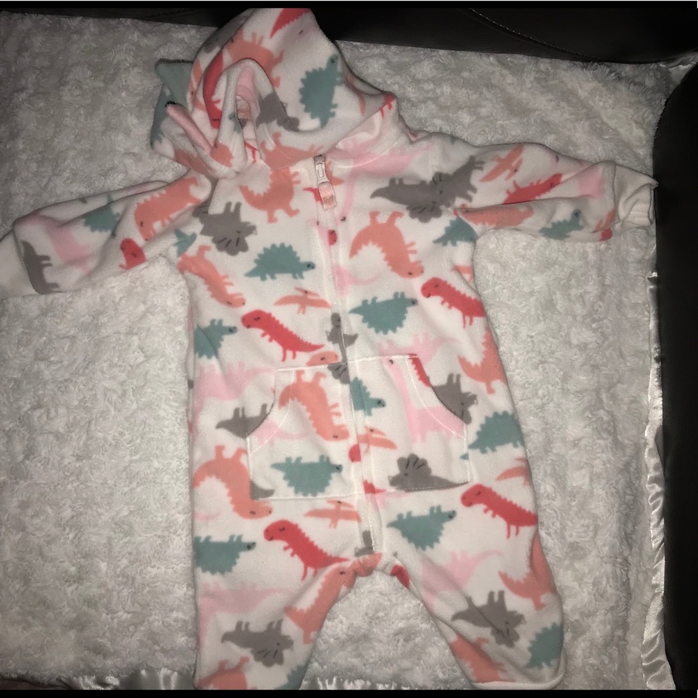 One piece dinosaur fleece **NEVER WORN**